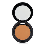 Silky olive foundation powder in a versatile 8g format, offers buildable coverage, cruelty-free, wet or dry application.