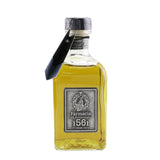 Stylish glass diffuser with black reeds, releasing enchanting scents for a fresh and elegant home atmosphere.