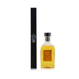 Elegant 250ml diffuser with black reeds, delivering fresh scents and banishing odors, housed in a stylish glass bottle.
