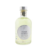 Nicolai Un Soir En Sicile diffuser in elegant glass, delivering a captivating scent for 8+ weeks to elevate your home ambiance.