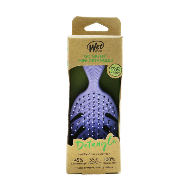 Vibrant purple Go Green Mini Detangler with eco-friendly bristles for painless detangling, ideal for all hair types on the go.