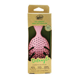 Vibrant pink Wet Brush Go Green Mini Detangler with eco-friendly bristles for gentle, effective detangling on the go.