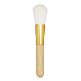 Elegant Tatcha Powder Brush with ergonomic design, 24K gold ferrule, and antibacterial wood handle for flawless makeup application.