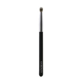 Dome-shaped eye brush with soft vegan bristles, perfect for precise contouring and intense color application.