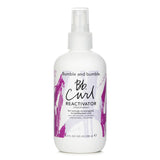 Moisturizing mist for curly hair with avocado, coconut, jojoba oils; revitalizes, reduces frizz, and provides light hold.