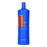 Fanola No Orange Shampoo 1000ml, a blue-pigmented toner for neutralizing brassiness, infused with coconut oil for shine and hydration.