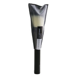 Angled Maybelline Facestudio 100 Powder Brush for flawless makeup application with soft, durable fibers.