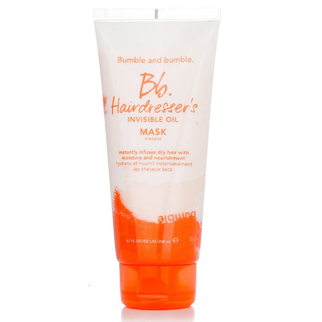 Bumble and Bumble's 6-oil Hairdresser's Invisible Oil Mask nourishes hair, reducing frizz for soft, shiny strands.