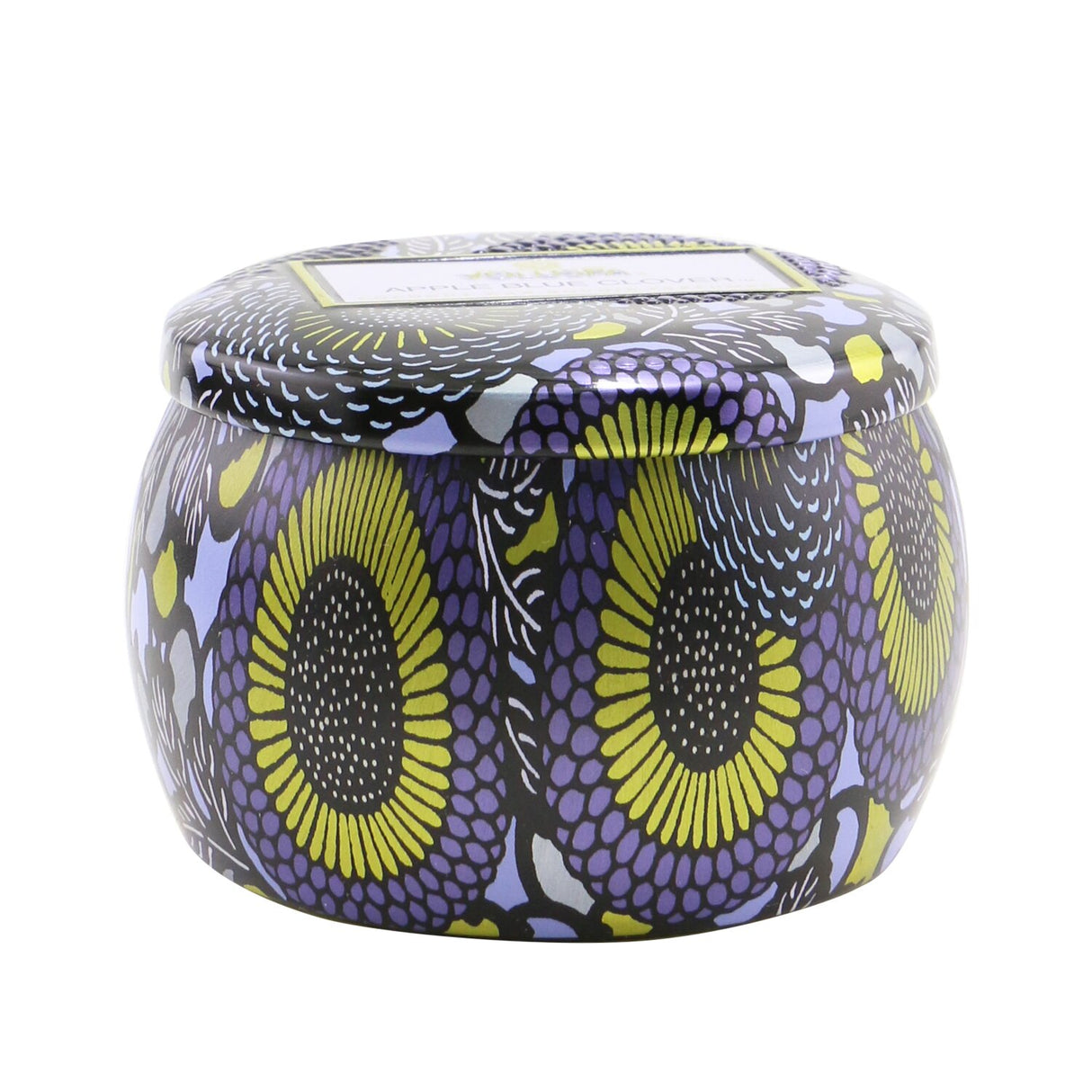 Mini tin candle in rich hues, featuring apple and blue clover scent, made with coconut wax for a clean burn and charming decor.