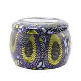 Voluspa Mini Tin Candle in Apple Blue Clover, featuring a coconut wax blend for 25 hours of enchanting fragrance in a decorative tin.