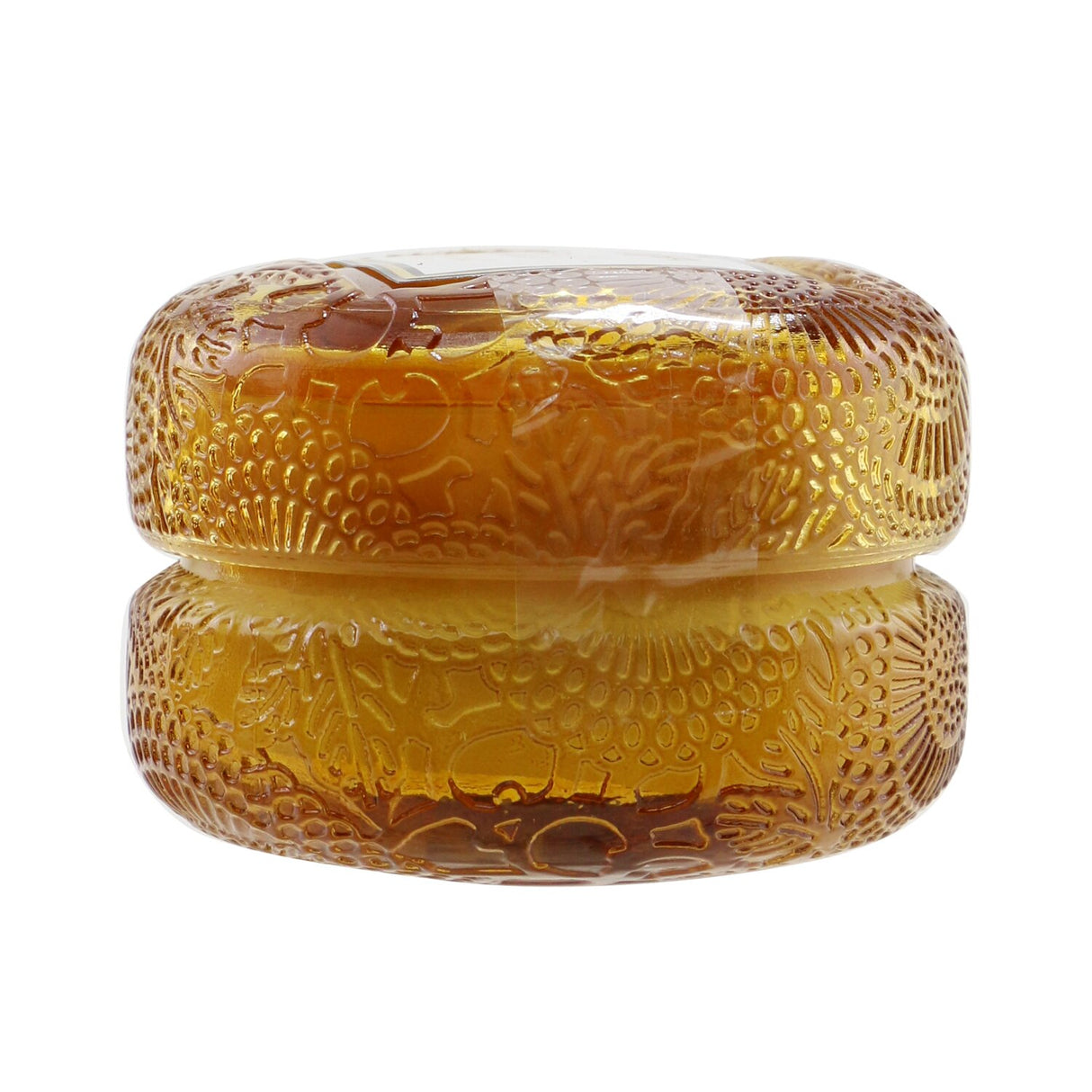 Elegant Voluspa Macaron Candle in Baltic Amber, 5.1g, with geometric glass design and eco-friendly coconut wax blend.