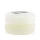 Voluspa Macaron Candle in geometric glass, Spiced Goji Tarocco Orange scent, free from harmful chemicals, 15-hour burn time.
