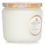 A petite jar candle in Italian Bellini scent, featuring sweet peach and sparkling champagne, elegantly presented in a decorative glass jar.