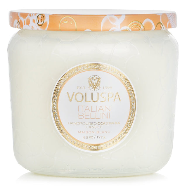 Elegant Voluspa Petite Jar Candle in Italian Bellini, featuring notes of peach and champagne in a stylish glass container.
