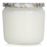 Voluspa Petite Jar Candle in Suede Blanc, 127g, featuring a luxurious scent, clean burn, and elegant embossed glass container.