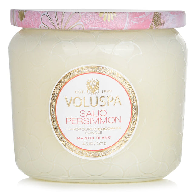 Voluspa Petite Jar Candle in Saijo Persimmon, featuring a coconut wax blend, natural wicks, and a decorative embossed glass jar.