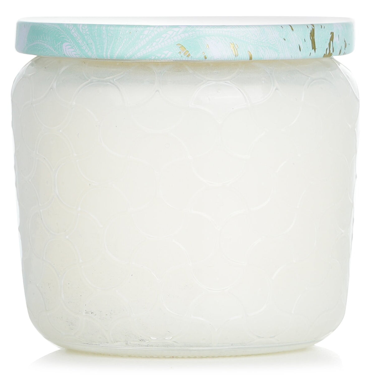 Voluspa Petite Jar Candle in Laguna, a 127g eco-friendly candle in an embossed glass jar, offers a refreshing ocean breeze scent.