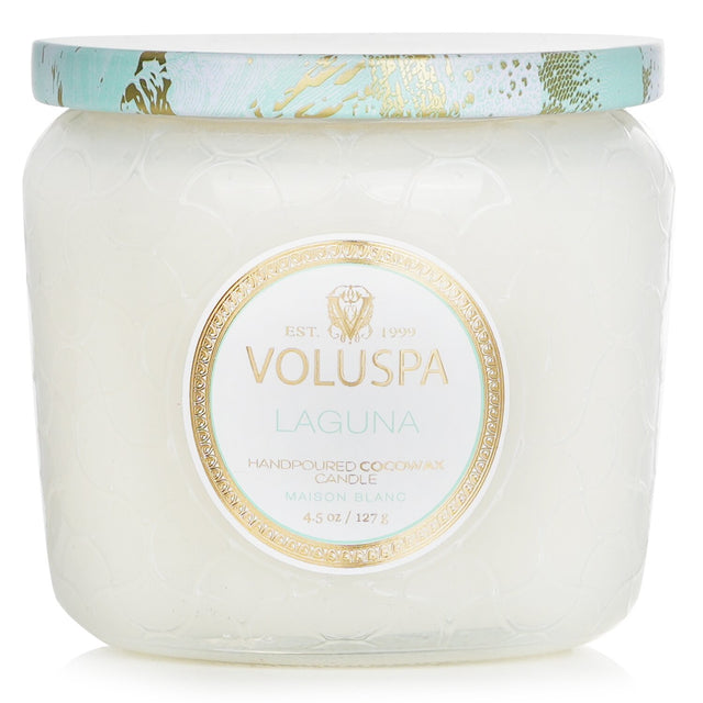 Voluspa Petite Jar Candle in Laguna: eco-friendly coconut wax, 35-hour burn, elegant embossed glass, soothing beach scent.