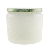 Petite jar candle in Moroccan Mint Tea scent, featuring a chic glass design and clean coconut wax blend for serene ambiance.