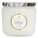 Miniature Voluspa Gardenia Colonia candle in a stylish glass jar, featuring natural wax for a clean 35-hour burn.