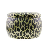 "Voluspa Mini Tin Candle in Suede Noir, featuring a coconut wax blend, natural wicks, and elegant metal tin for up to 25 hours of burn."