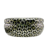 Luxurious 3-wick tin candle in Crisp Champagne fragrance, adorned with a metallic design, perfect for home decor and gifting.