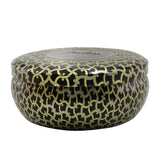 Voluspa 3 Wick Decorative Tin Candle in Suede Noir, featuring a rich fragrance, elegant design, and 40-hour burn time.