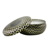 Voluspa Suede Noir tin candle with 3 wicks, coconut wax blend, rich jewel-toned design, 40-hour burn time.
