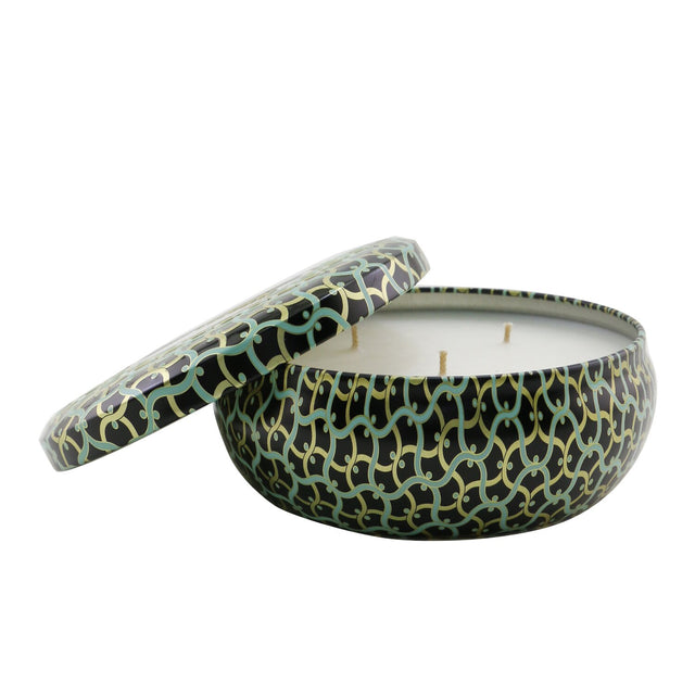 Voluspa's French Linen 3 Wick Candle in a decorative metallic tin, offering a luxurious scent and 40-hour burn time.
