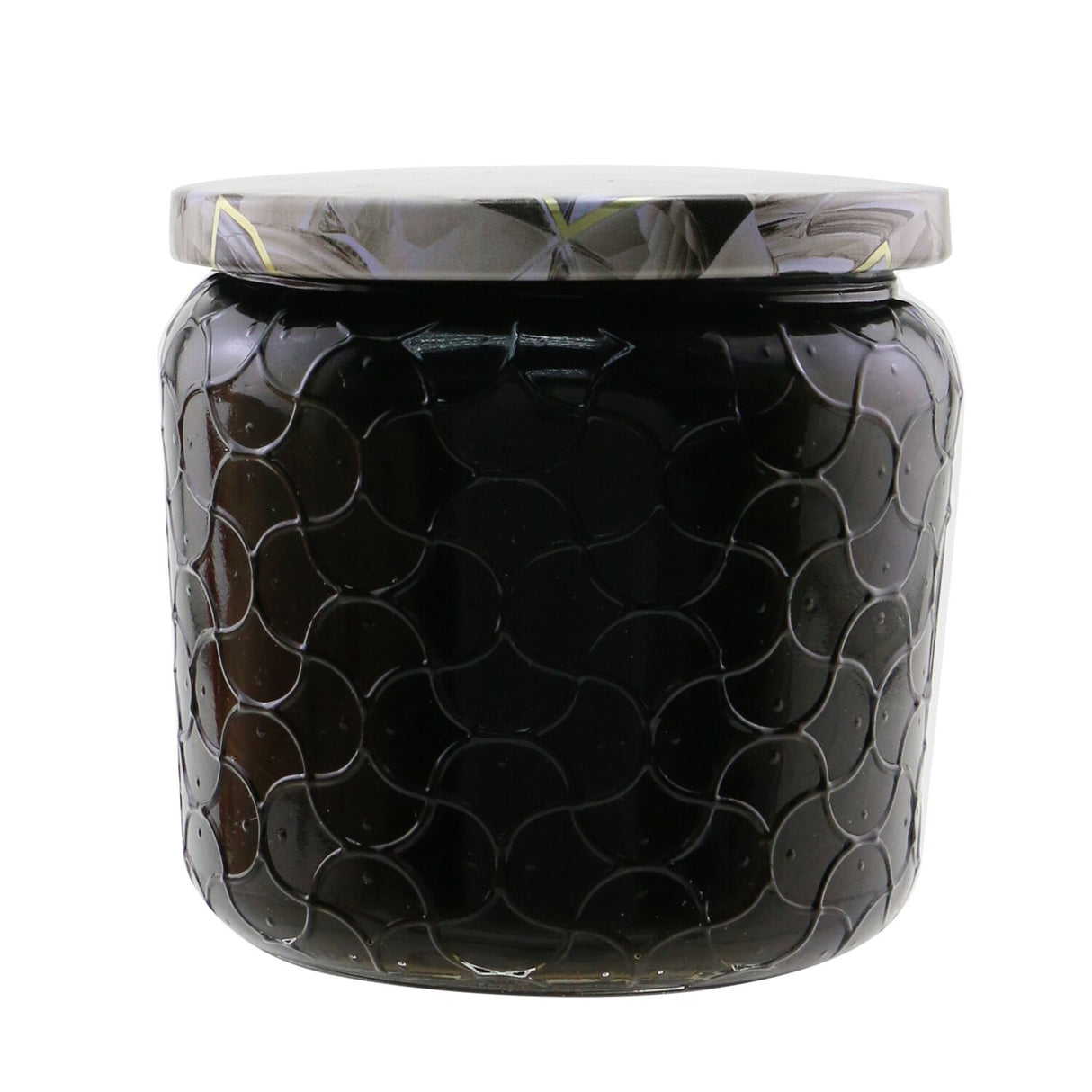 Voluspa Petite Jar Candle in Ambre Lumiere, 127g, features a chic embossed glass container and a soothing, enchanting fragrance.