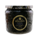 Voluspa Petite Jar Candle in Ambre Lumiere, 127g, in an embossed glass container with enchanting, long-lasting fragrance.