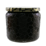 Voluspa Petite Jar Candle in Suede Noir, 127g eco-friendly candle with captivating fragrance and decorative glass container.