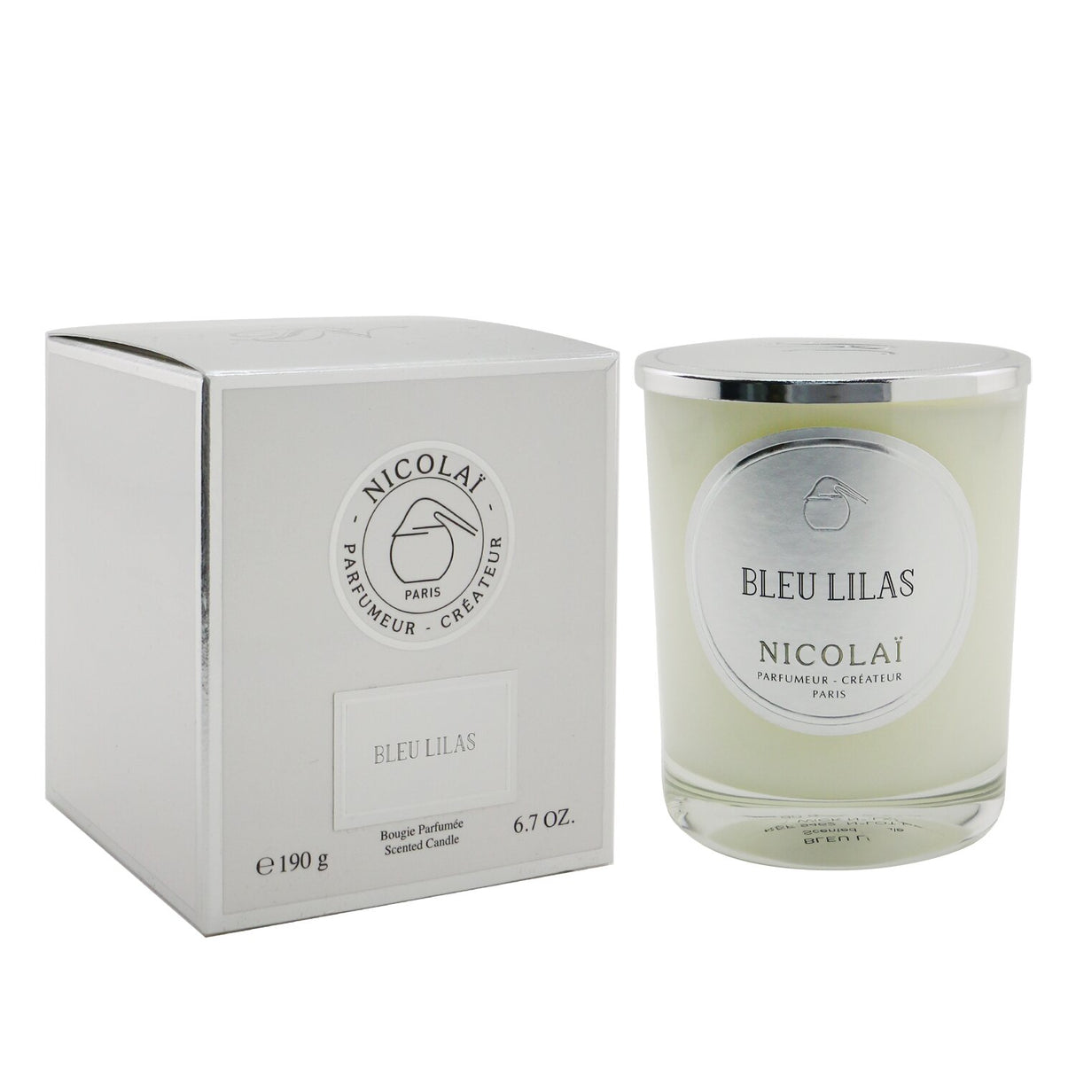 Nicolai Bleu Lilas scented candle in elegant glass, offering a lilac fragrance and up to 50 hours of soothing ambiance.