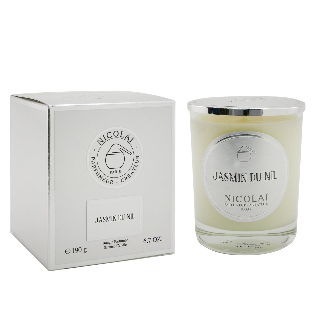 Luxurious Nicolai Jasmin Du Nil scented candle in a decorative glass container, offers a calming jasmine aroma for up to 50 hours.