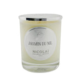 Elegant Nicolai scented candle in a stylish glass container, featuring a soothing jasmine fragrance with a 50-hour burn time.