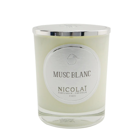 Elegant Nicolai Scented Candle in Musc Blanc, 190g, with natural wax and a warm fragrance for a calming ambiance.