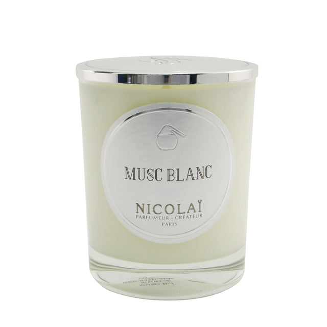 Elegant Nicolai Scented Candle in Musc Blanc, 190g, with natural wax and a warm fragrance for a calming ambiance.