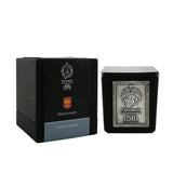 Luxurious handmade scented candle in an elegant glass vase with wooden wick, ideal for creating a serene ambiance at home.