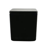 Luxurious Italian handcrafted scented candle in elegant glass vase, creating a warm ambiance and delightful fragrance.
