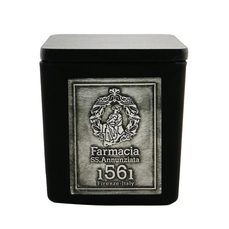 Luxurious handmade scented candle in an elegant glass vase, offering a warm, soft fragrance for relaxation and decor.