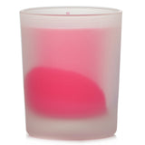 Luxurious Carthusia Gemme di Sole scented candle in an elegant glass holder, offering a warm, inviting fragrance for 20 hours.