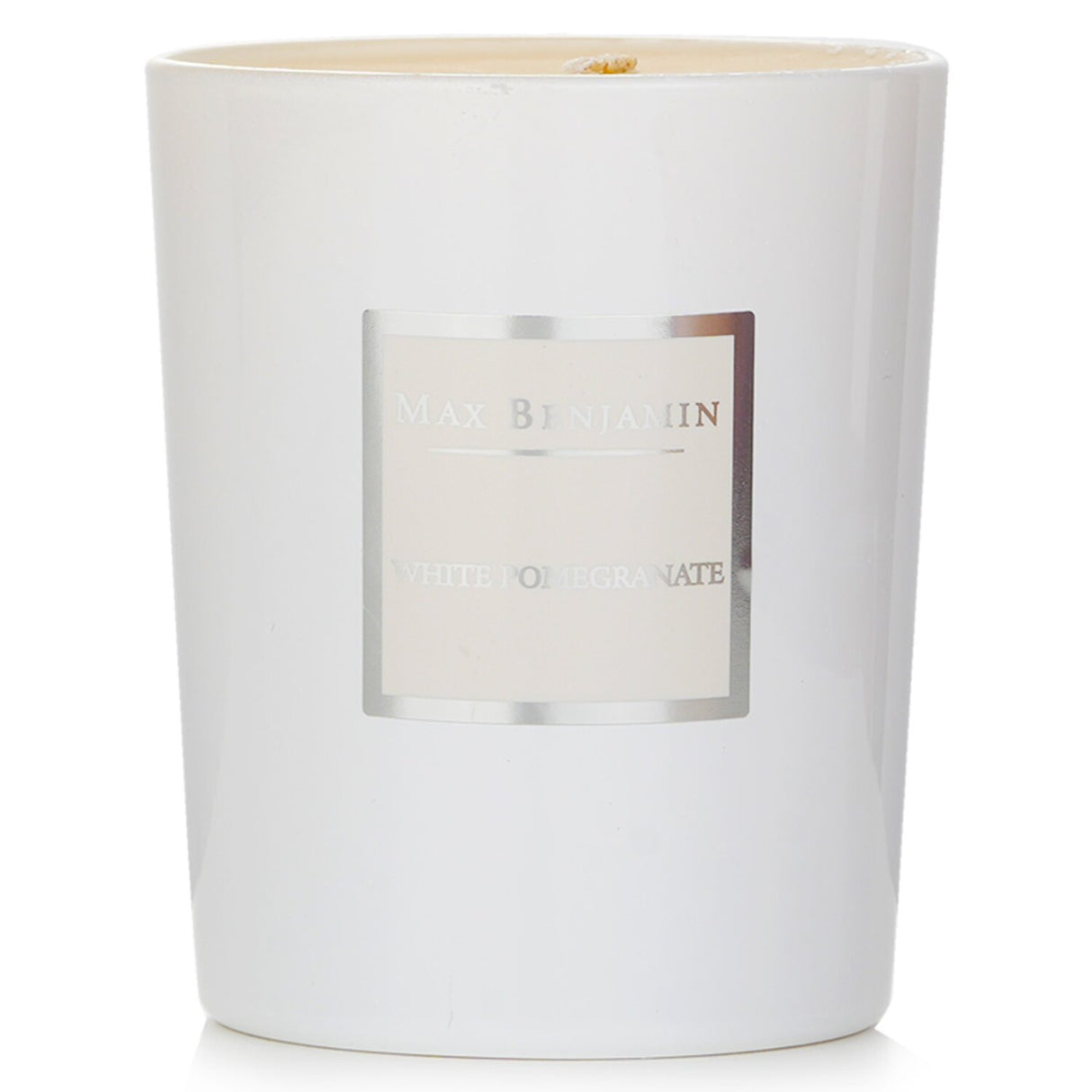 Max Benjamin White Pomegranate Candle in glass container, made with natural soy wax for a fruity scent and 40-hour burn time.