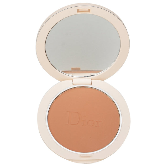 Natural bronze powder bronzer by Christian Dior in #02 Light Bronze, featuring 95% mineral pigments for a radiant complexion.