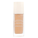 Liquid foundation with 96% natural ingredients, providing 24-hour wear for a flawless, nude-skin look, suitable for all skin types.