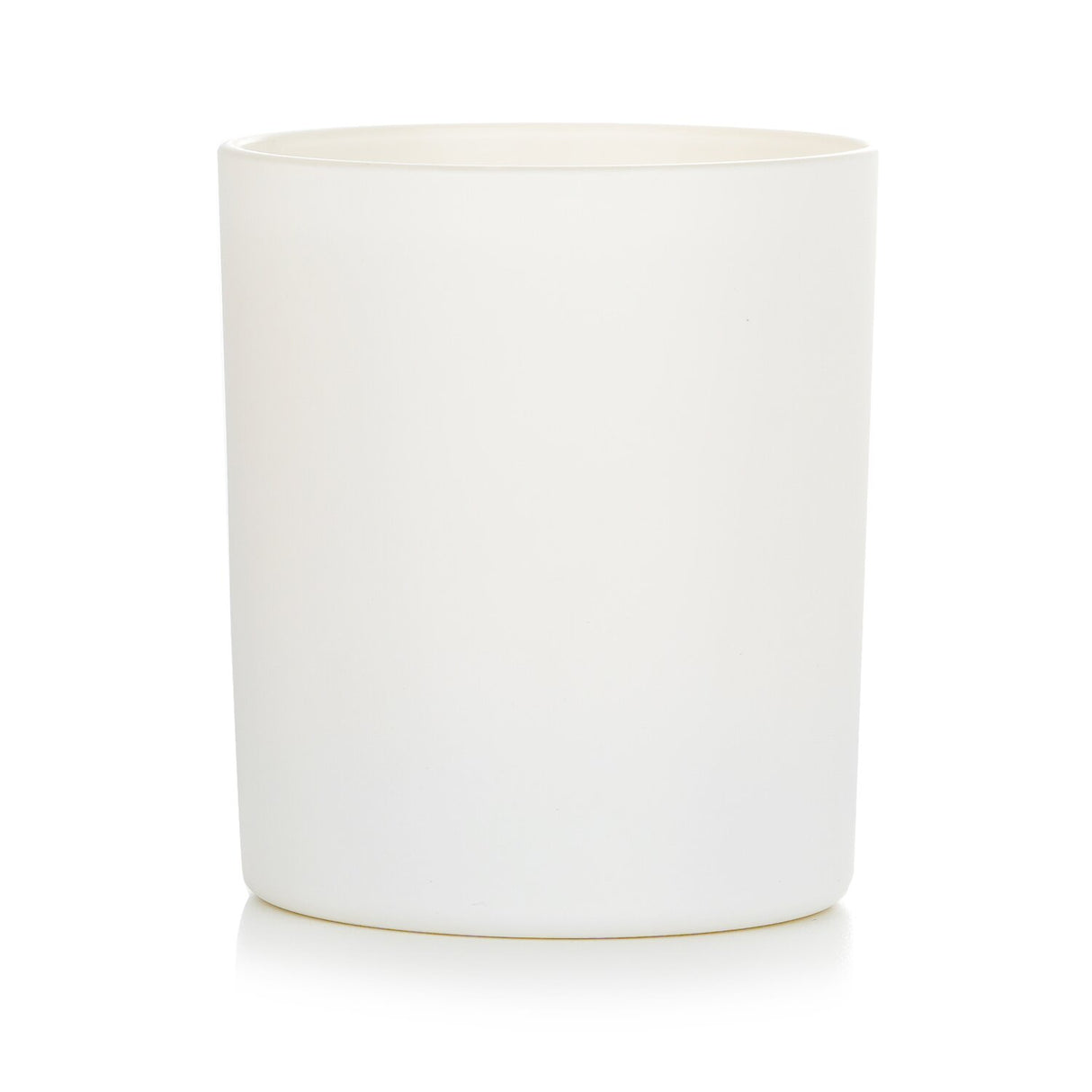 Cowshed Relax Candle in 220g jar, filled with calming chamomile and eucalyptus scent for a peaceful ambiance.