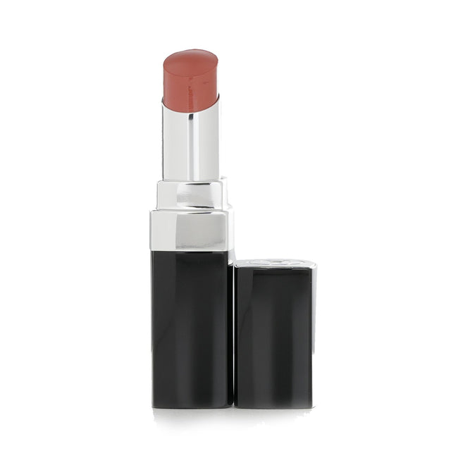 Luxurious Chanel lipstick in #110 Chance, offering intense color, hydration, and high shine in a chic transparent case.