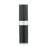 Chanel Rouge Coco Bloom Lip Colour #112 in elegant case, offers hydrating, plumping shine for vibrant, supple lips.