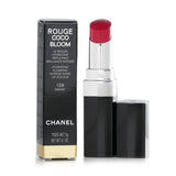 Chanel Rouge Coco Bloom #128 Magic lipstick offers intense shine with hydrating, plumping formula in a chic case.