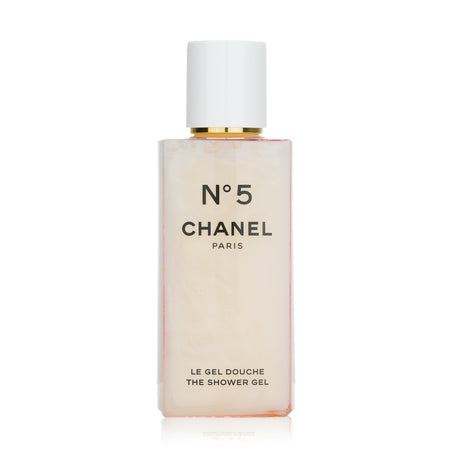 Chanel No.5 Shower Gel in a pink-tinted bottle, creamy texture for gentle cleansing, and iconic fragrance for a luxurious shower experience.