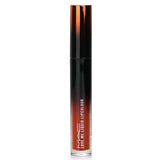 MAC Love Me Liquid Lipcolour in #487 My Lips Are Insured, a vibrant burnt orange with a satin finish and hydrating formula.